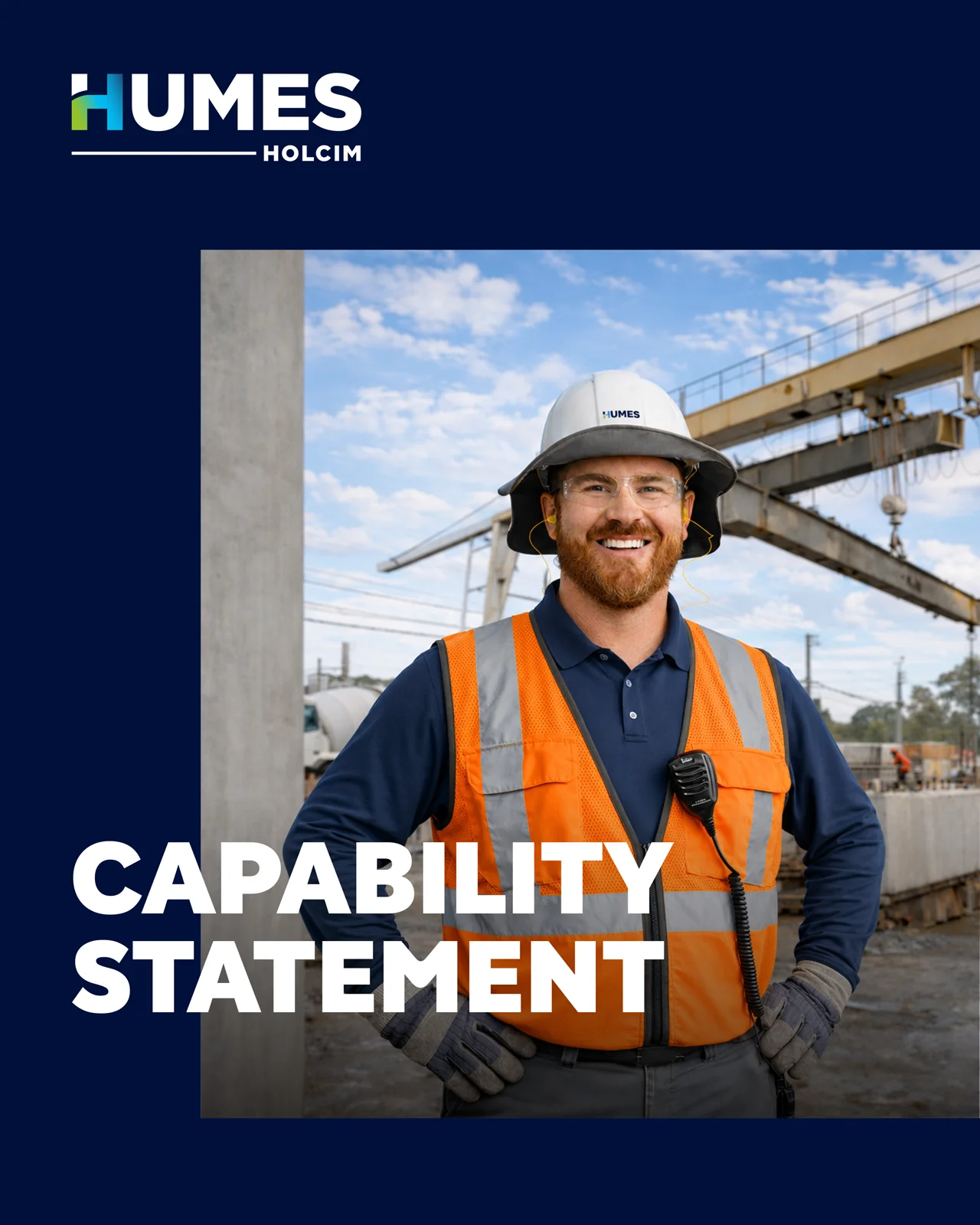 4x5 cover of the Humes Capability Statement showing a smiling Humes worker in a hard hat and hi-vis vest at a precast yard with a gantry crane.